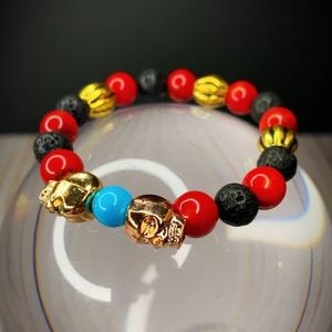 Handmade Lava stone,red coral and Turquoise with matching skulls by SoulinStone